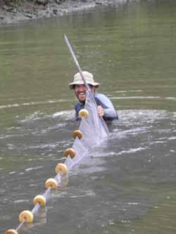 kory angstat up to his neck in field work